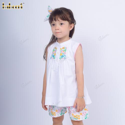 Girls set with floral embroidery on the bodice and printed Spring